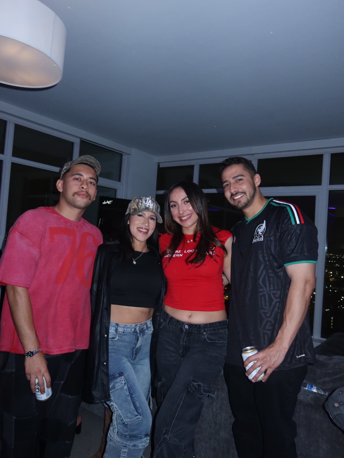 T's Birthday — group shot with the city skyline